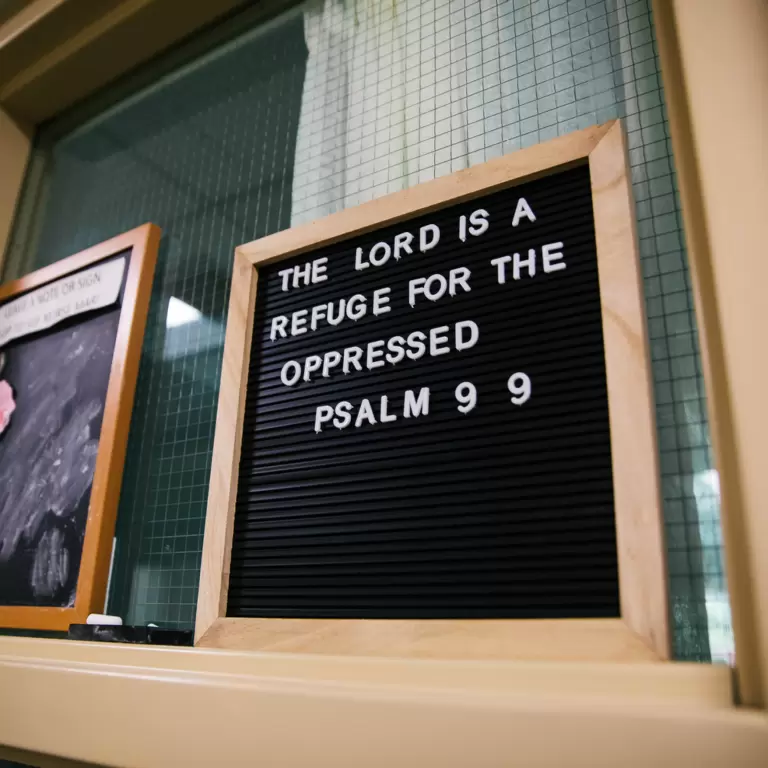 Letter board reading "The Lord is a refuge for the oppressed, Psalm 9 9"