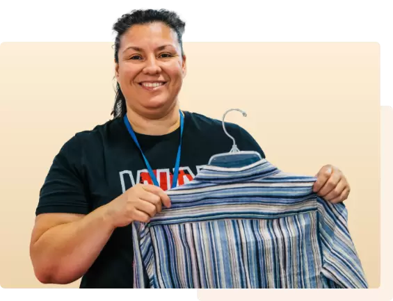 Woman holding a shirt