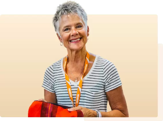 Woman with short gray hair smiling